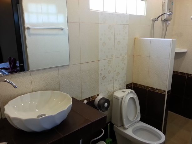 Imagen de la habitación del Hotel Exotic Bungalows. Foto 4