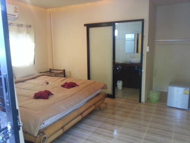 Imagen de la habitación del Hotel Exotic Bungalows. Foto 5