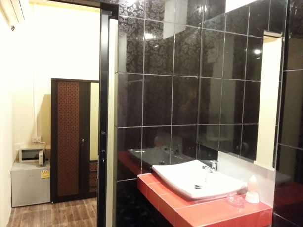 Imagen de la habitación del Hotel Exotic Bungalows. Foto 6