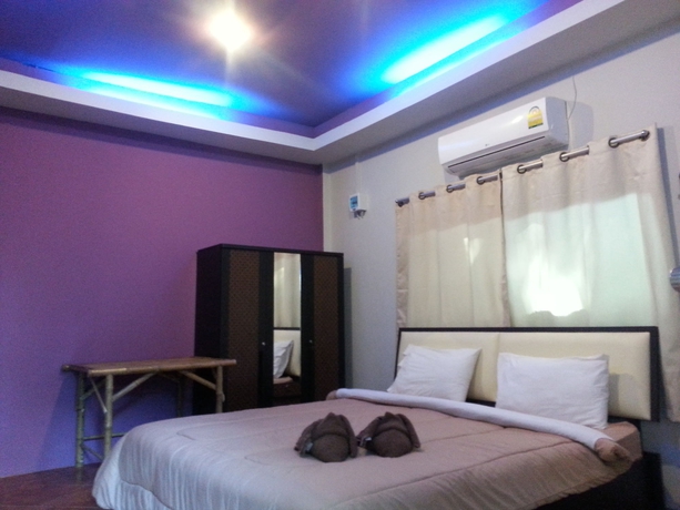 Imagen de la habitación del Hotel Exotic Bungalows. Foto 7