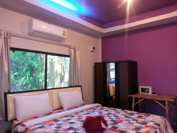 Imagen de la habitación del Hotel Exotic Bungalows. Foto 8