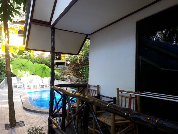 Imagen de la habitación del Hotel Exotic Bungalows. Foto 9