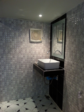 Imagen de la habitación del Hotel Exotic Bungalows. Foto 10