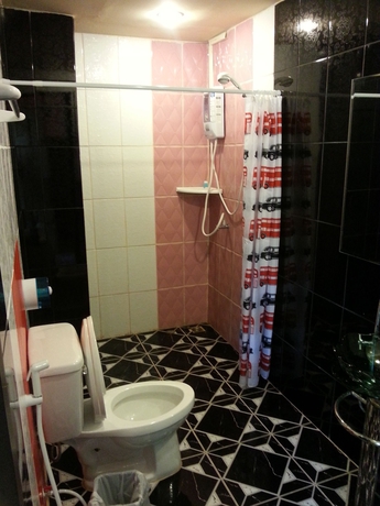Imagen de la habitación del Hotel Exotic Bungalows. Foto 11