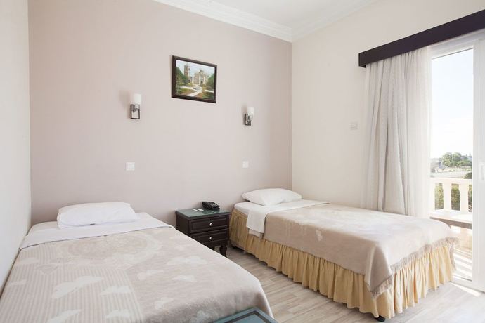 Imagen de la habitación del Hotel Exotic. Foto 7