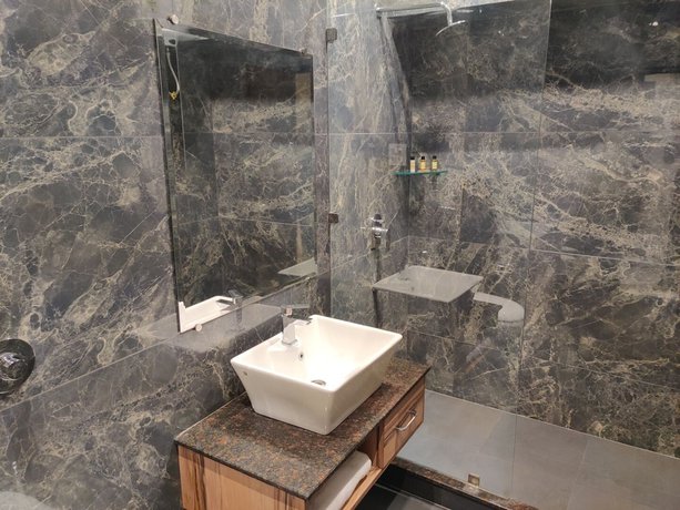Imagen de la habitación del Hotel Exotic Homes. Foto 7