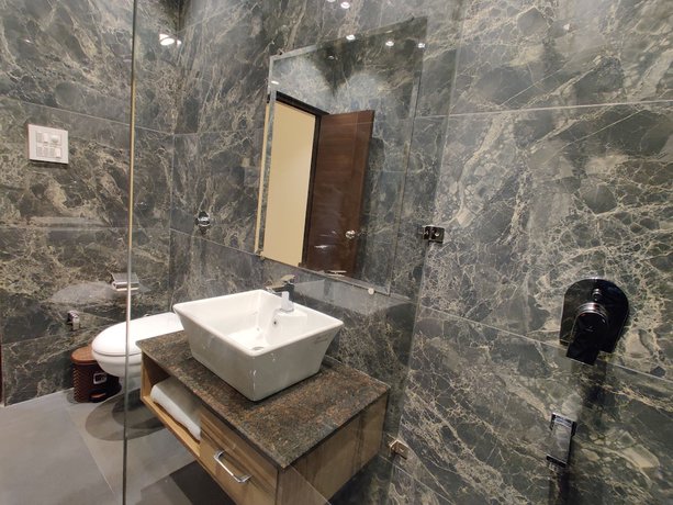 Imagen de la habitación del Hotel Exotic Homes. Foto 8