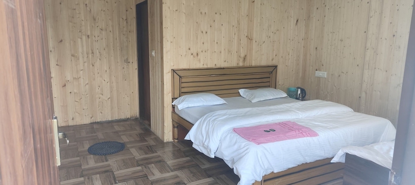 Imagen de la habitación del Hotel Exotic Mount View. Foto 2