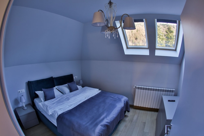 Imagen de la habitación del Hotel Expecto Apartments. Foto 6