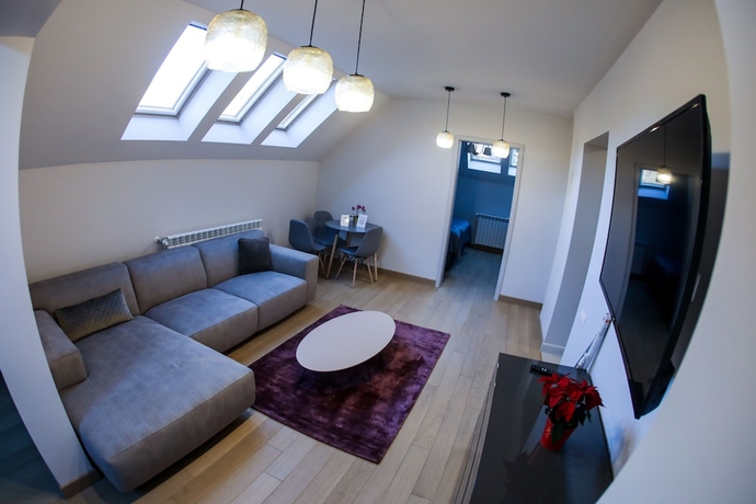 Imagen de la habitación del Hotel Expecto Apartments. Foto 17