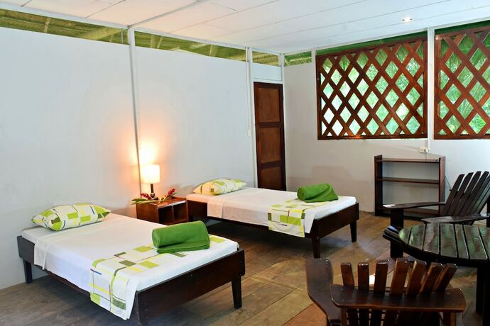 Imagen de la habitación del Hotel Explorama Lodge. Foto 19