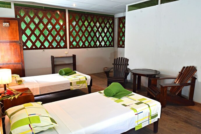 Imagen de la habitación del Hotel Explorama Lodge. Foto 20