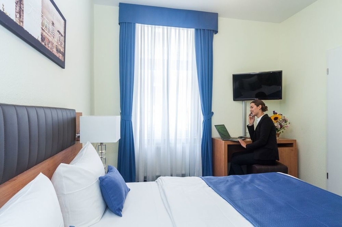 Imagen de la habitación del Hotel Expo Frankfurt City Centre. Foto 3