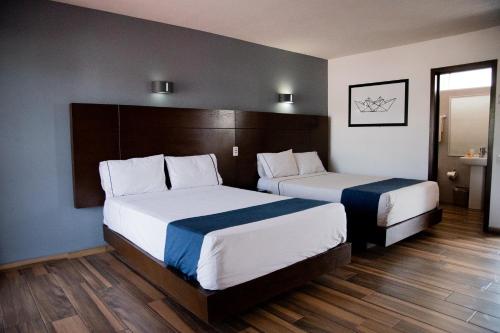 Imagen de la habitación del Hotel Expo Plaza Business and Family Guadalajara. Foto 3