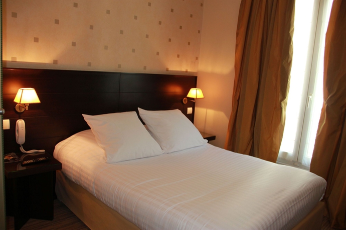 Imagen de la habitación del Hotel Exposition Tour Eiffel. Foto 4