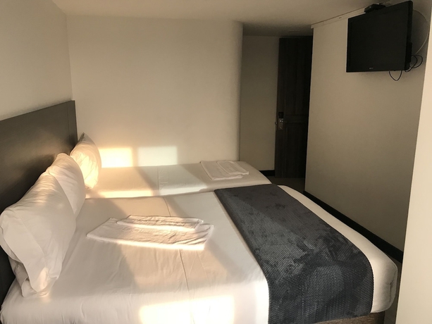 Imagen de la habitación del Hotel Express 53. Foto 9