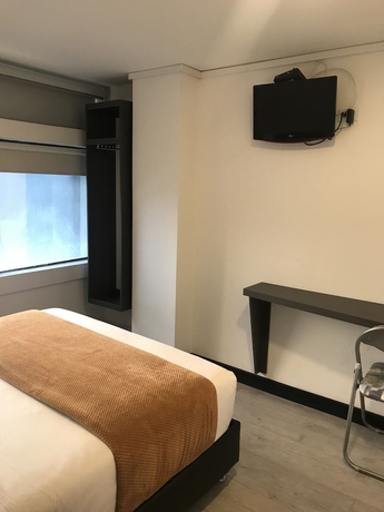 Imagen de la habitación del Hotel Express 53. Foto 13