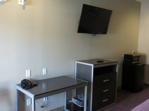 Imagen de la habitación del Hotel Express Inn - Spring. Foto 4