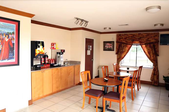 Imagen del bar/restaurante del Hotel Express Inn and Suites, Westwego. Foto 8