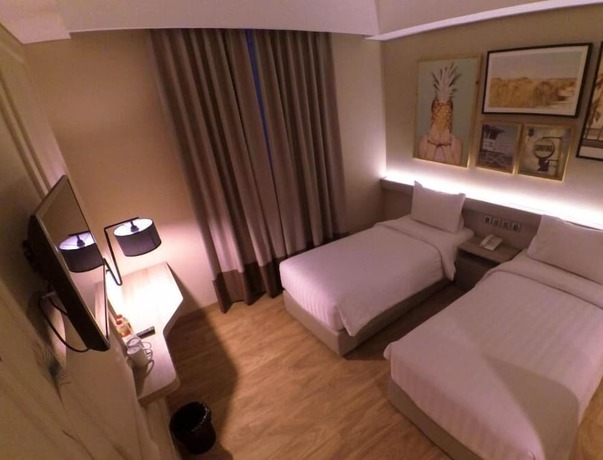 Imagen de la habitación del Hotel Expressia Makassar. Foto 2