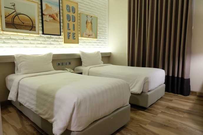 Imagen de la habitación del Hotel Expressia Makassar. Foto 3