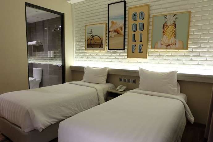 Imagen de la habitación del Hotel Expressia Makassar. Foto 5