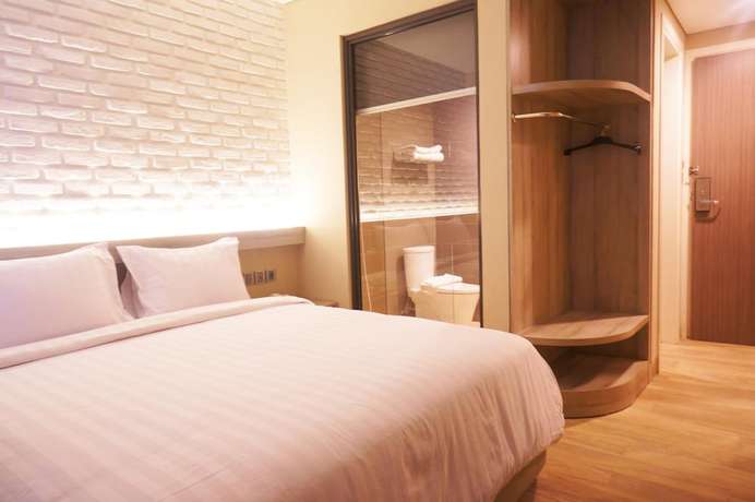 Imagen de la habitación del Hotel Expressia Makassar. Foto 8