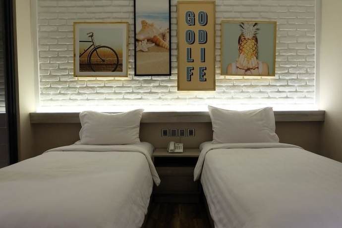 Imagen de la habitación del Hotel Expressia Makassar. Foto 10