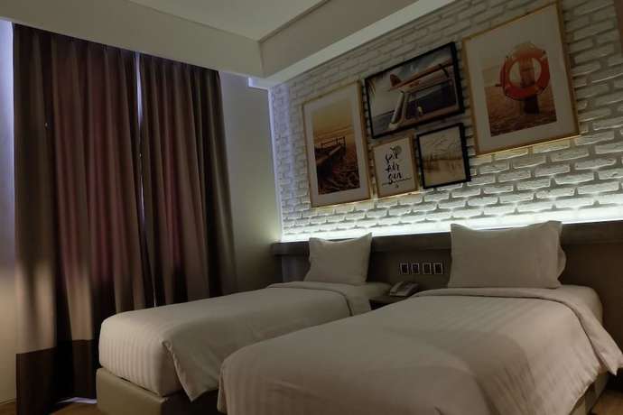 Imagen de la habitación del Hotel Expressia Makassar. Foto 12