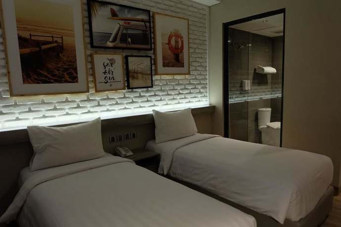 Imagen de la habitación del Hotel Expressia Makassar. Foto 14