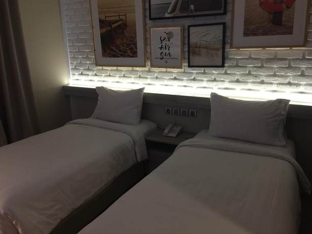 Imagen de la habitación del Hotel Expressia Makassar. Foto 15