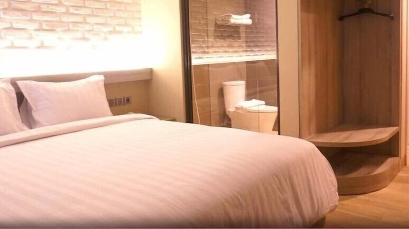 Imagen de la habitación del Hotel Expressia Makassar. Foto 18