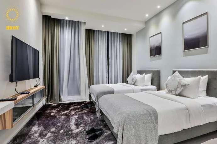 Imagen de la habitación del Hotel Expressionz Suites by iHost Global. Foto 3