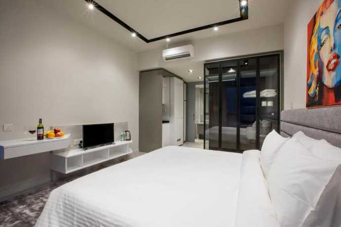 Imagen de la habitación del Hotel Expressionz Suites by iHost Global. Foto 5