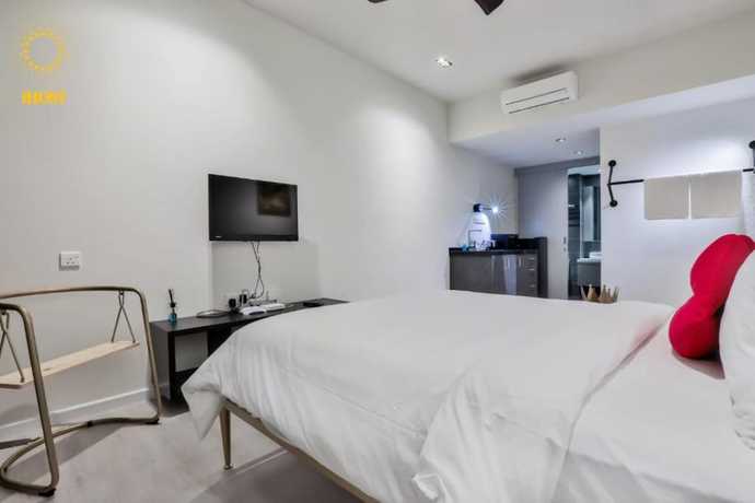 Imagen de la habitación del Hotel Expressionz Suites by iHost Global. Foto 18