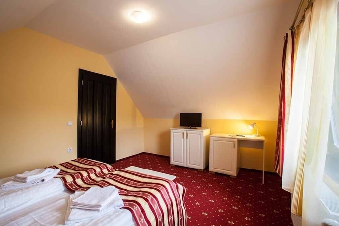 Imagen de la habitación del Hotel Extravagance. Foto 7