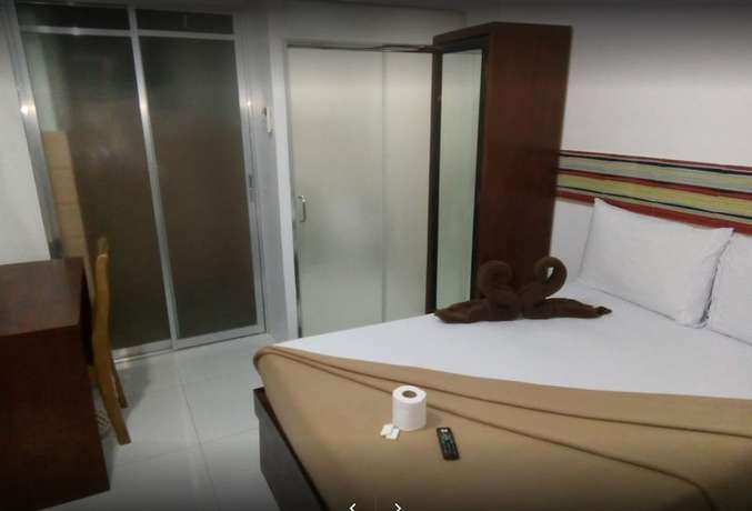 Imagen de la habitación del Hotel Ey Miners Suites Navarro. Foto 3