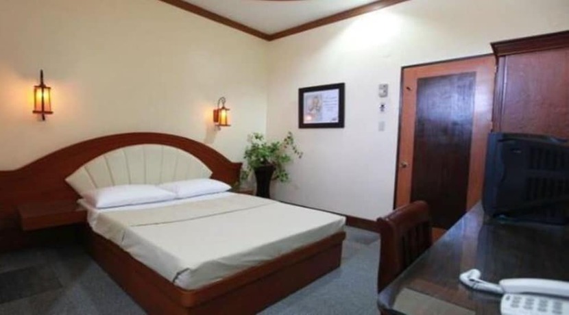 Imagen de la habitación del Hotel Ey Miners Suites Navarro. Foto 7