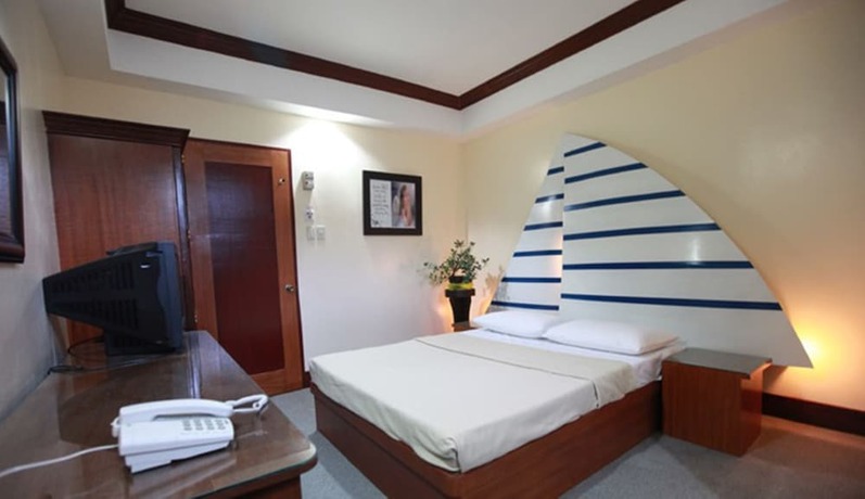 Imagen de la habitación del Hotel Ey Miners Suites Navarro. Foto 8