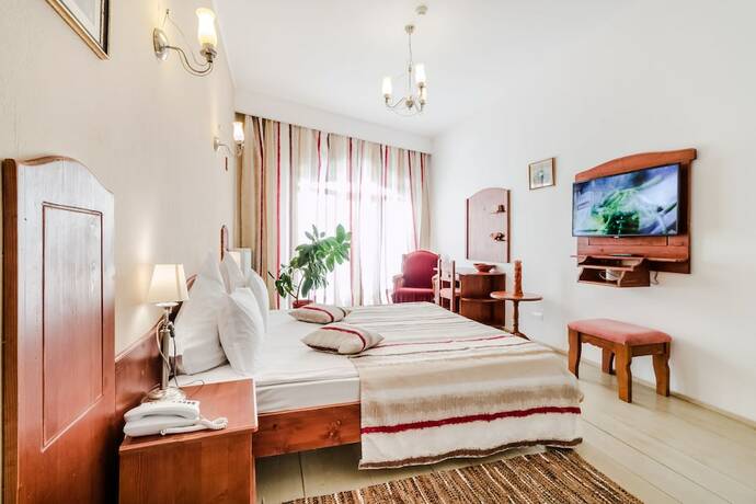 Imagen de la habitación del Hotel Ezio Brasov. Foto 14