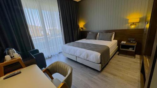 Imagen de la habitación del Hotel Ezkar Bathonea Art Istanbul. Foto 18