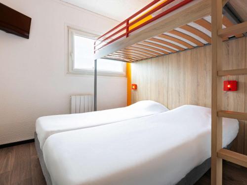 Imagen de la habitación del Hotel F1 Reims Tinqueux. Foto 9