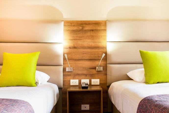 Imagen de la habitación del Hotel F25. Foto 4