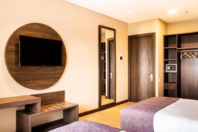 Imagen de la habitación del Hotel F25. Foto 5