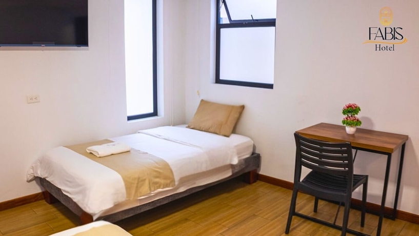 Imagen de la habitación del Hotel FABIS HOTEL. Foto 8