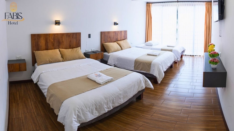 Imagen de la habitación del Hotel FABIS HOTEL. Foto 14