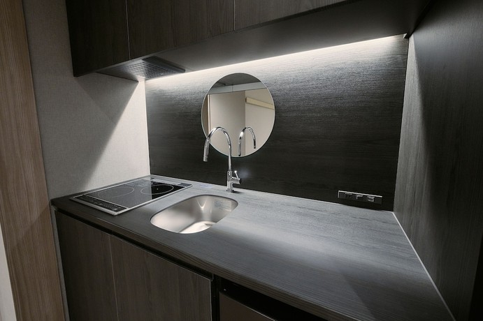 Imagen de la habitación del Hotel FAV HOTEL HIROSHIMA STADIUM. Foto 8