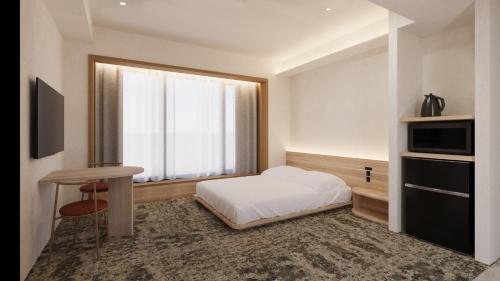 Imagen de la habitación del Hotel FAV LUX Kagoshima Tenmonkan. Foto 8