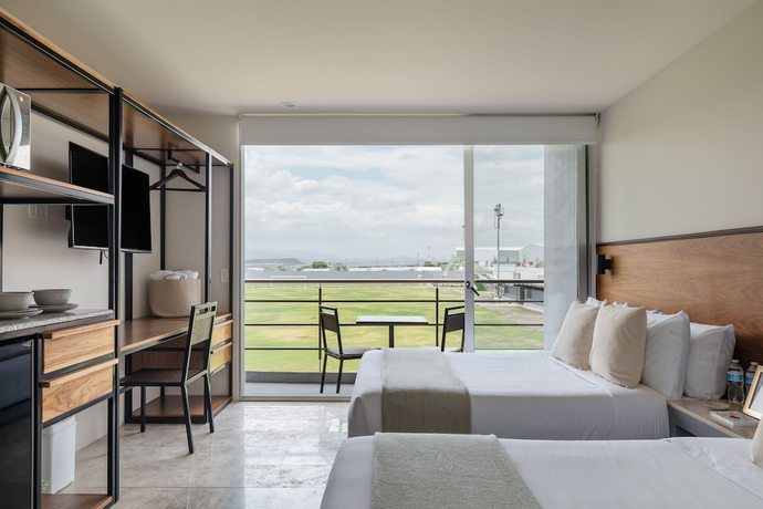 Imagen de la habitación del Hotel FC TOTAL. Foto 5
