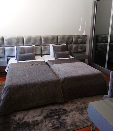 Imagen de la habitación del Hotel FH. Foto 10